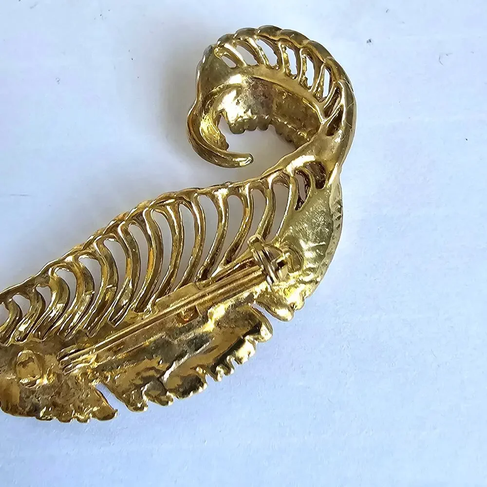 Source Unknown vintage feather